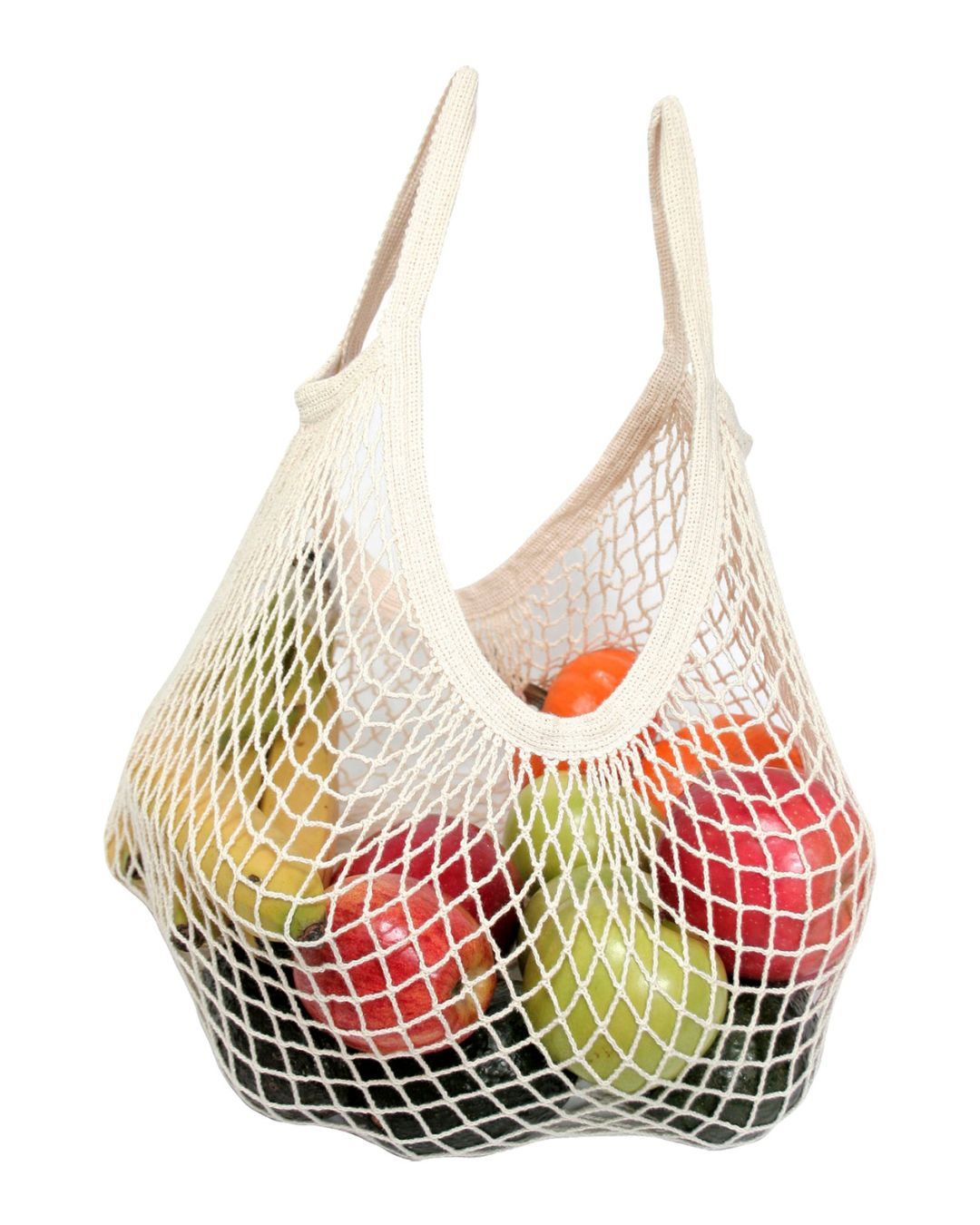 Net string grocery bag filled with fruits on a white background