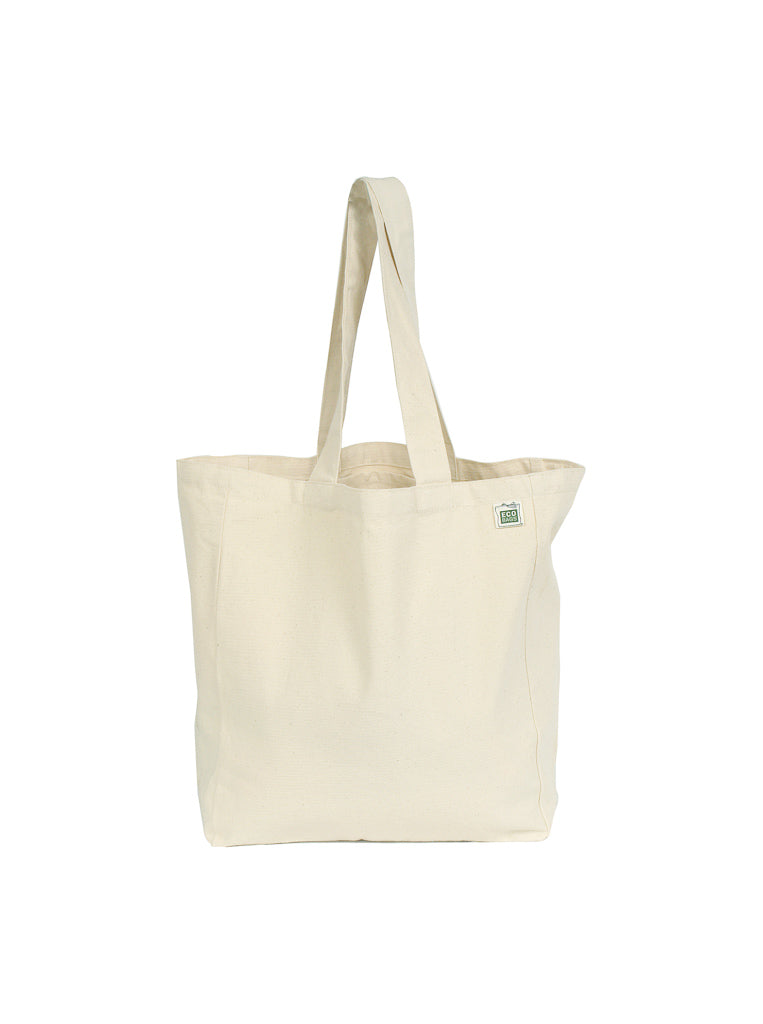 A beige canvas tote bag  with bottom gusset expanded